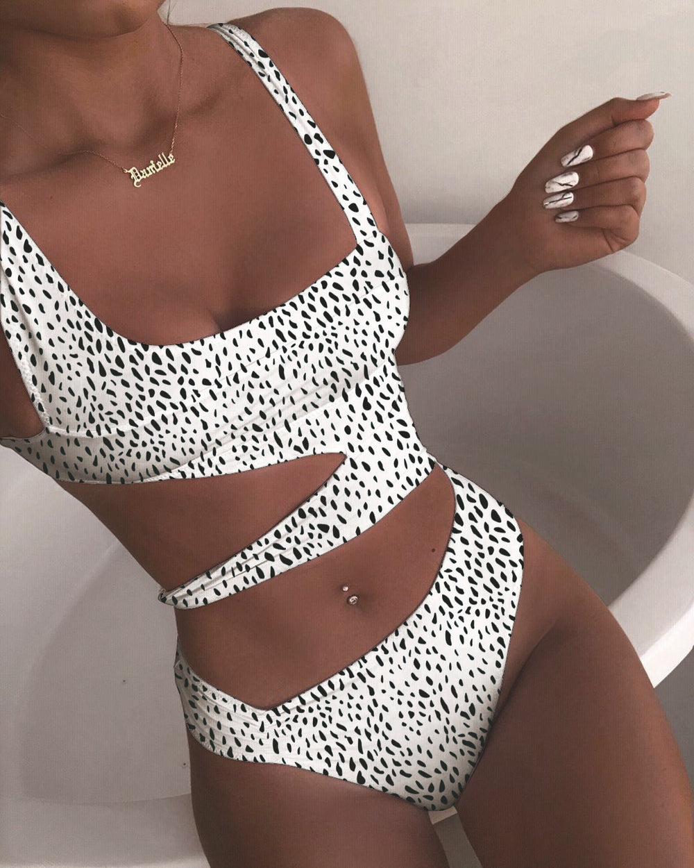 “Tori Cutout Swimsuit”