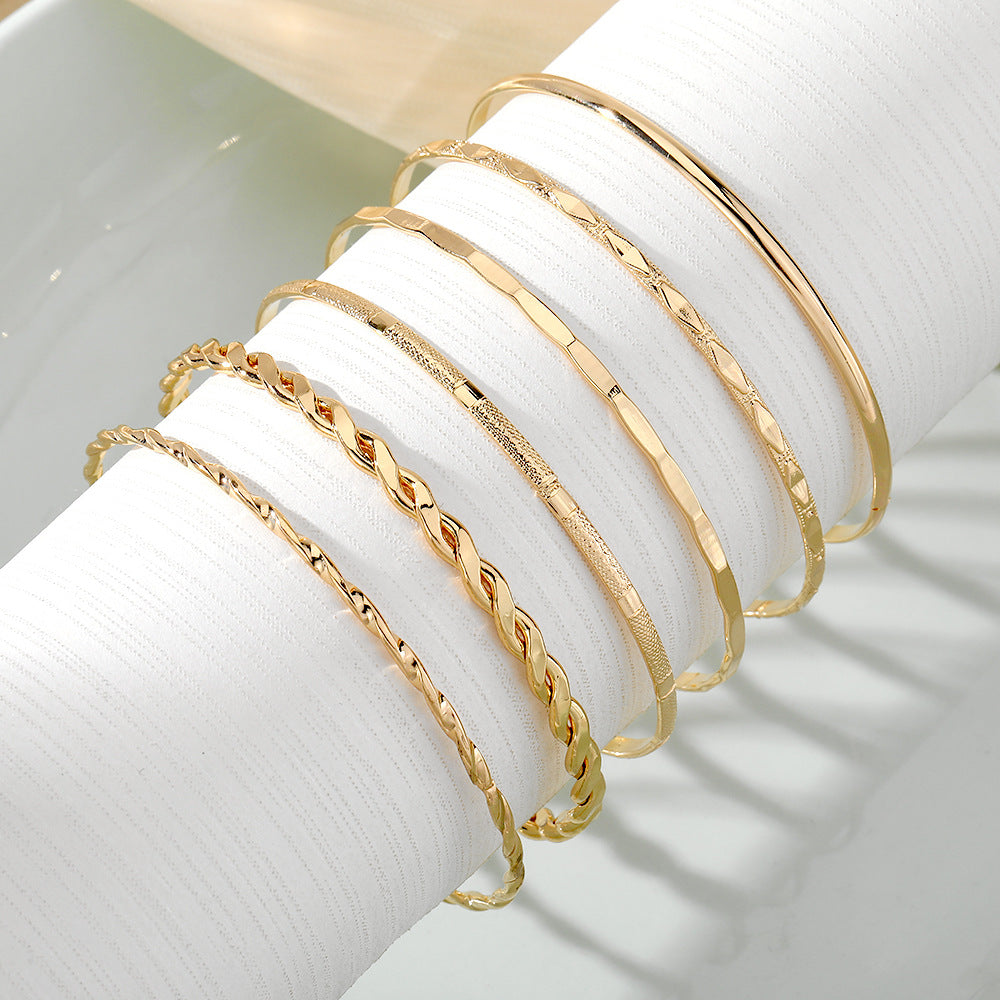 “Stacked Gold Fashion Bangles”