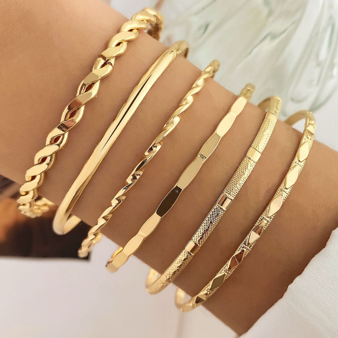 “Stacked Gold Fashion Bangles”